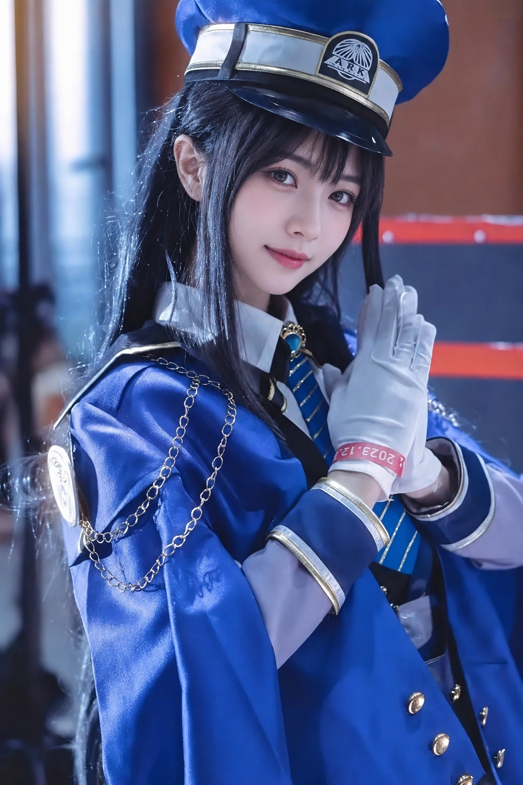 A blue anime-style uniform cosplay with tailored trim, gloves, cap detail, and polished character styling.