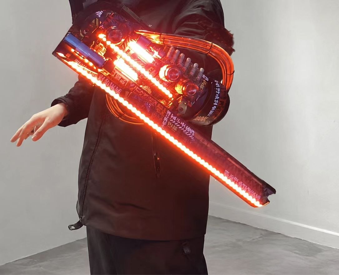 Cyberpunk 2077 motorcycle-style elbow, wrist, and foot guard prop set with red light strips and black sci-fi armor finish.