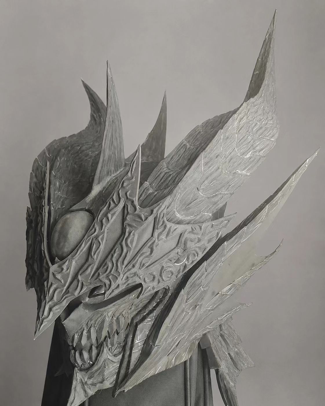 Painted black dragon-style custom cosplay helmet.