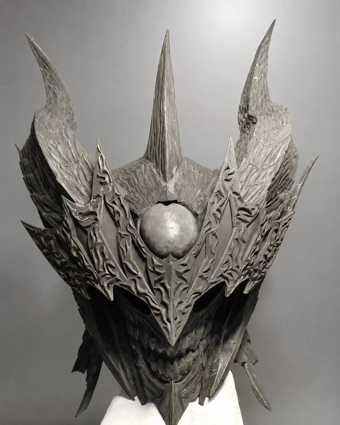 Black dragon-inspired custom cosplay helmet side view.