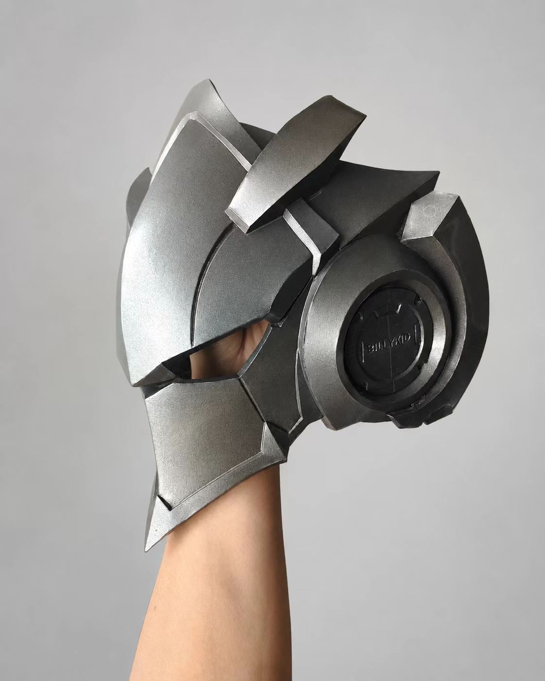 Close-up of a custom cosplay helmet mask finish.