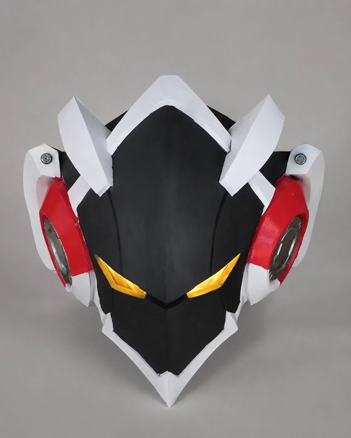 Gold and red custom EVA cosplay helmet profile view.