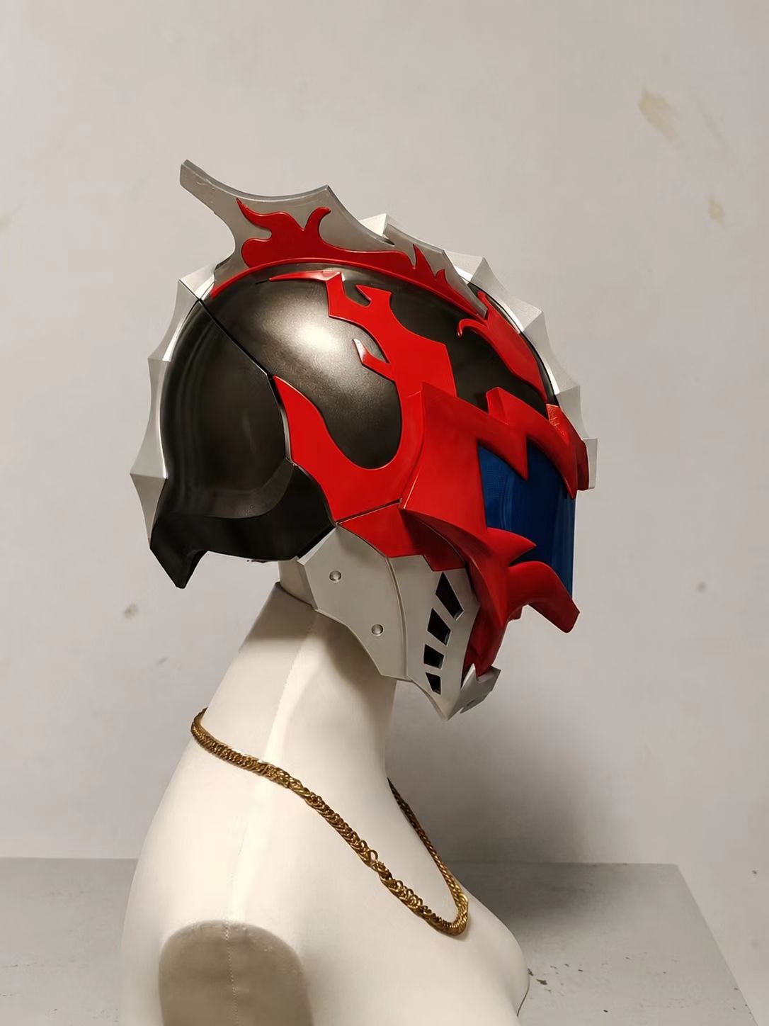 Painted red and blue custom cosplay helmet finish.