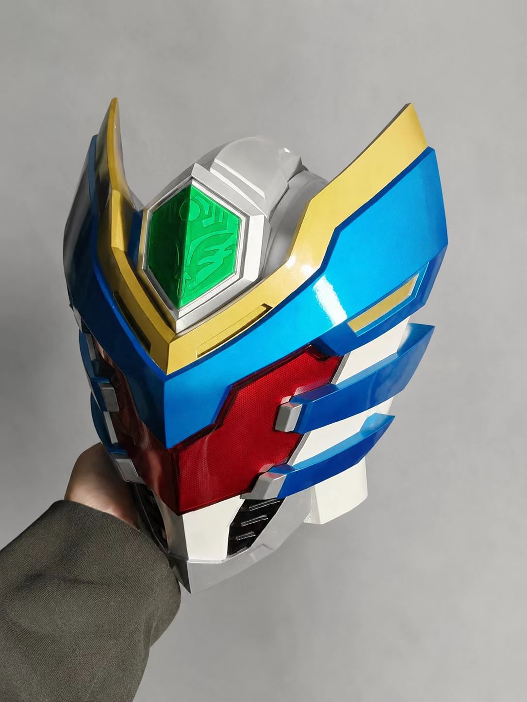 Smooth red round custom cosplay visor body with painted finish.