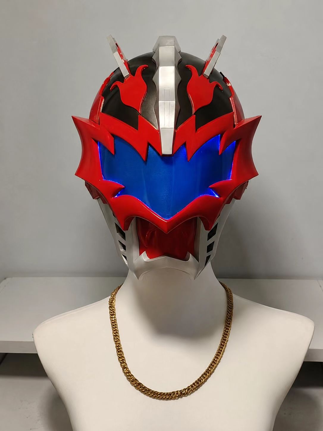 Silver and gold custom cosplay helmet front detail.