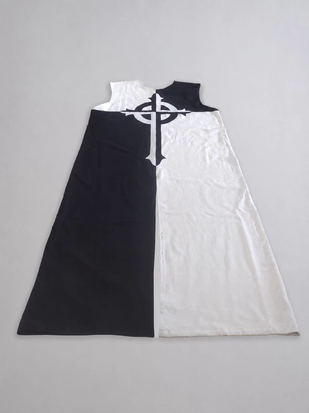 Flat black and white medieval cosplay tabard with cross design.