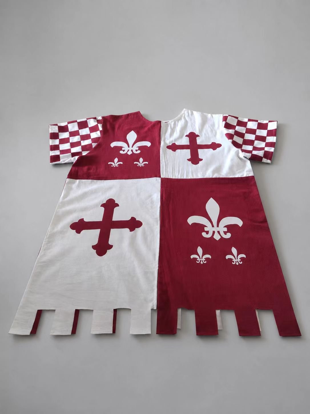 Burgundy and white medieval cosplay tabard with checker sleeve detail.