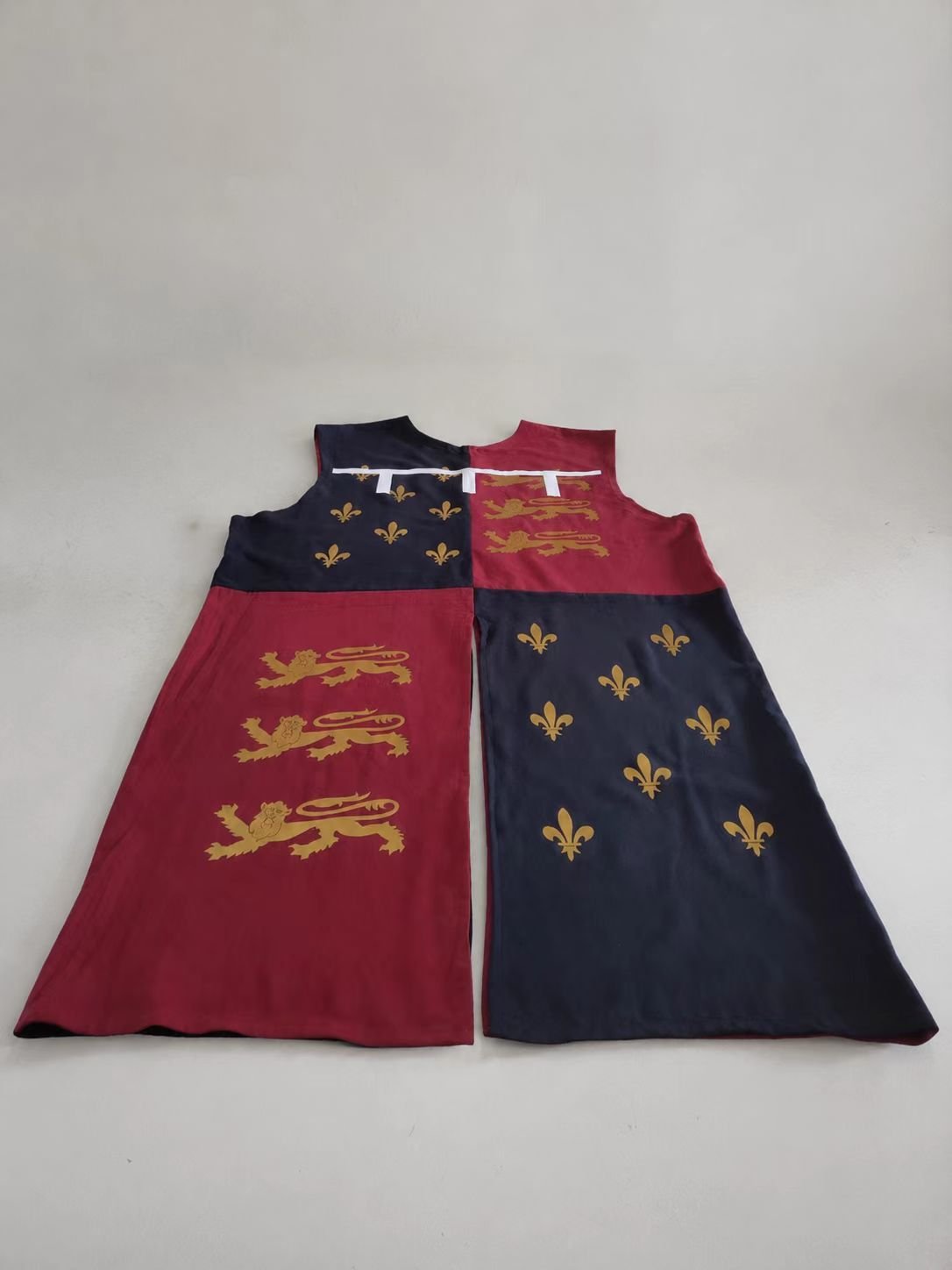Flat medieval cosplay tabard with Plantagenet royal arms motifs.