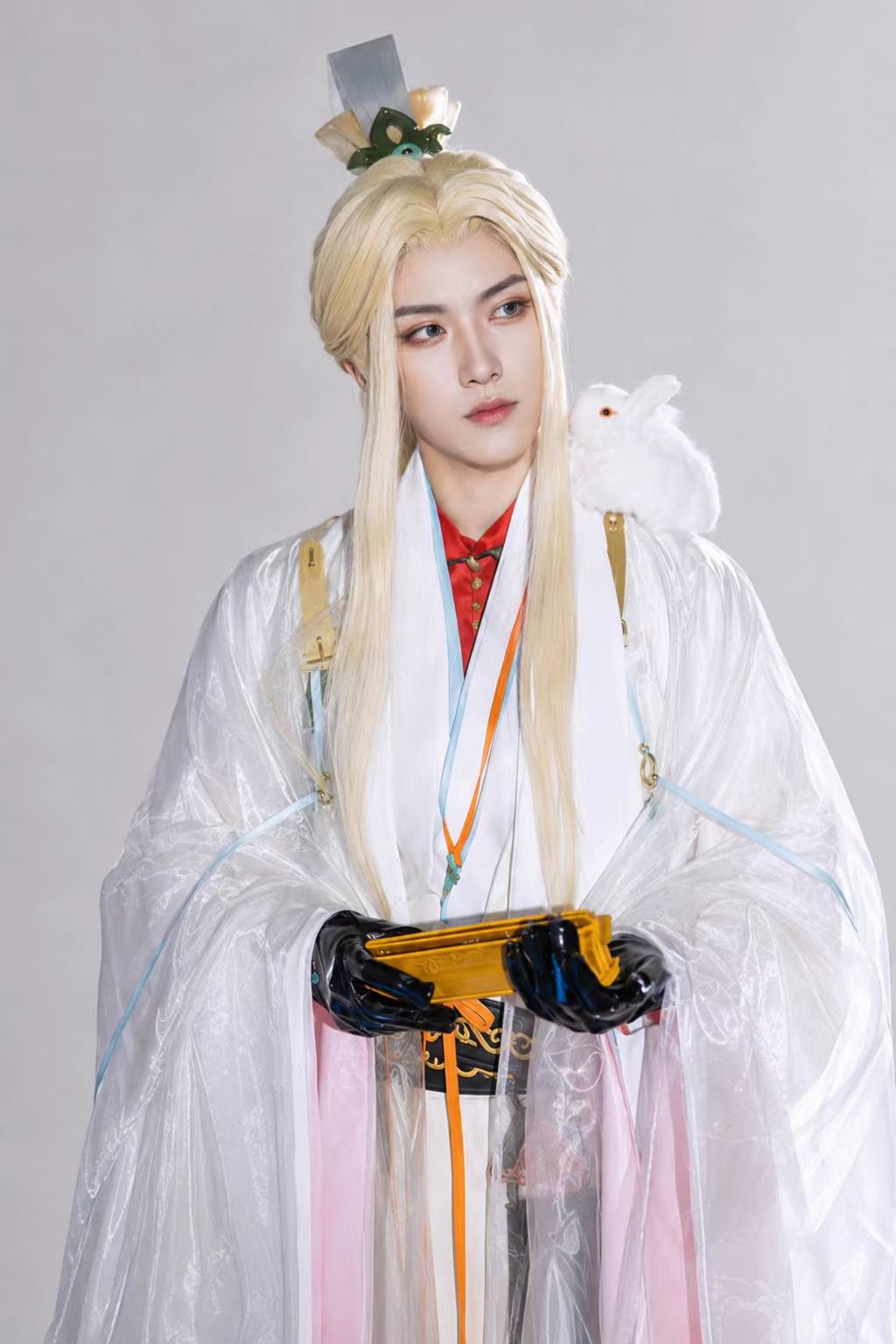 Zhang Zhongjing inspired layered hanfu cosplay set with translucent wide sleeves, white robe layers, orange-red inner layer, black gloves, waist belt, and pouch.